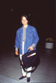 Jodie Foster photo print in striped shirt and denim jacket at LAX