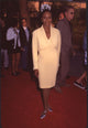 Suzzanne Douglas in a yellow dress and jacket at the Nutty Professor premiere photo print.