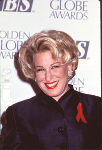 Bette Midler photo print in black jacket with red ribbon pin