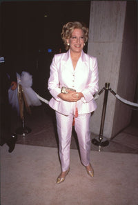 Bette Midler in a pink pant suit at 'That Old Feeling' premiere photo print.