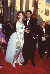 Geena Davis in blue off shoulder gown with Jeff Goldblum in tuxedo at Oscars photo print