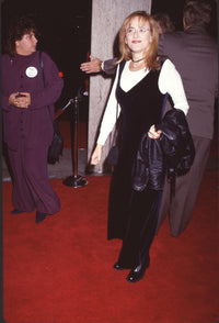 Marlee Matlin wearing a velvet jumper with white long sleeves at Philadelphia Premiere - Photo Print