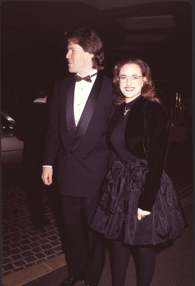 David E. Kelley in tuxedo and Marlee Matlin in black dress with velvet jacket at Golden Globes photo print.