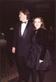 David E. Kelley in tuxedo and Marlee Matlin in black dress with velvet jacket at Golden Globes photo print.