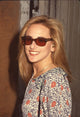 Marlee Matlin close-up photo print in floral top and sunglasses.