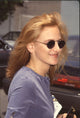 Close-up photo print of Marlee Matlin in blue shirt and sunglasses at celebrity pool event.