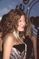 Tori Spelling close-up photo print in black and white dress with pearl necklace.