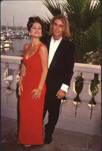 Yasmine Bleeth in red gown with Jaason Simmons at Baywatch party photo print