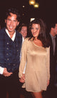 Ricky Paull Goldin in plaid vest with Yasmine Bleeth in gold dress at Planet Hollywood opening photo print.