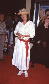 Jacqueline Bisset in white dress with red belt at Mickey Blue Eyes premiere photo print.