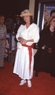 Jacqueline Bisset in white dress with red belt at Mickey Blue Eyes premiere photo print.