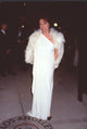 Jacqueline Bisset in white gown and feather boa at Vanity Fair Oscar Party photo print
