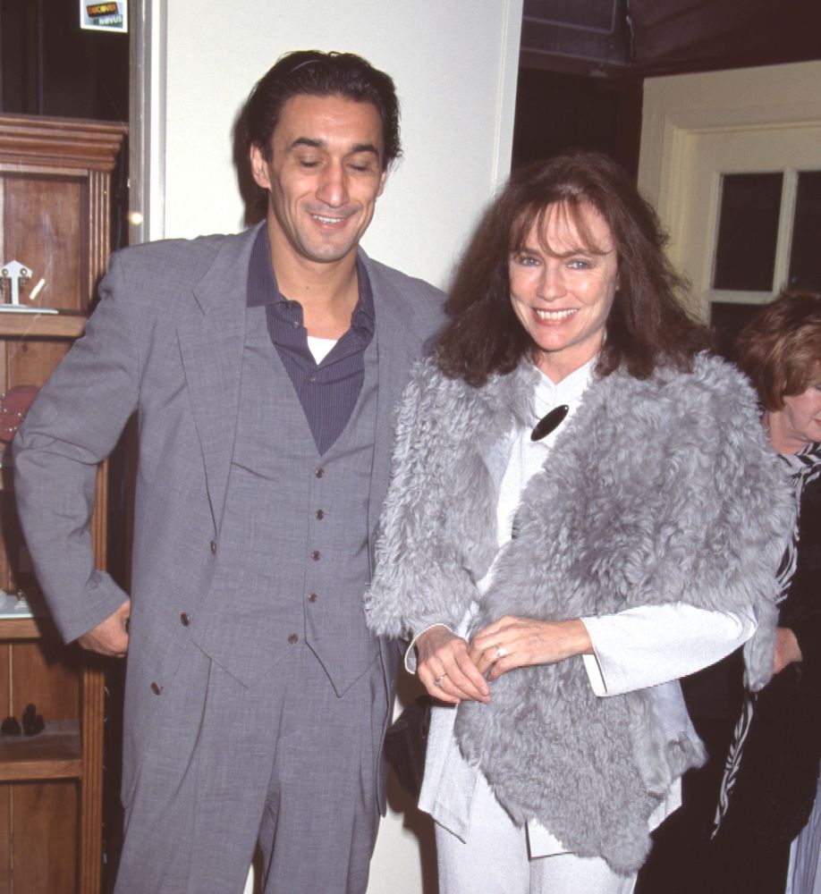Emin Boztepe in gray suit and Jacqueline Bisset in gray fur at Movieline Magazine Party Photo Print