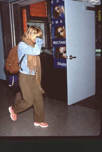 Claire Danes in baggy green pants at LAX - Photo Print