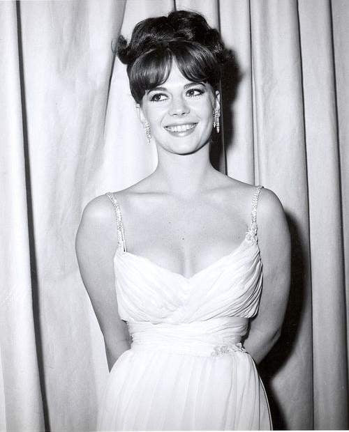 Natalie Wood - Hands Behind Back Photo Print showcasing classic Hollywood elegance.