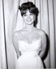 Natalie Wood - Hands Behind Back Photo Print showcasing classic Hollywood elegance.