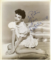 Natalie Wood Kneeling Signed Photo Print capturing the iconic actress.