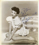 Natalie Wood Kneeling Signed Photo Print capturing the iconic actress.