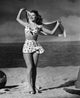 Ava Gardner in a polka dot bikini photo print showcasing classic Hollywood glamour.