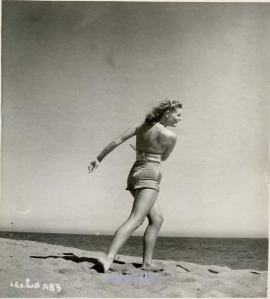 Running on Beach Photo Print by Alexis Smith, showcasing a serene beach scene.