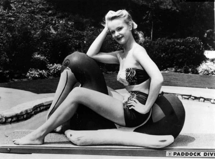 Anne Francis Pool Float Photo Print showcasing vintage charm