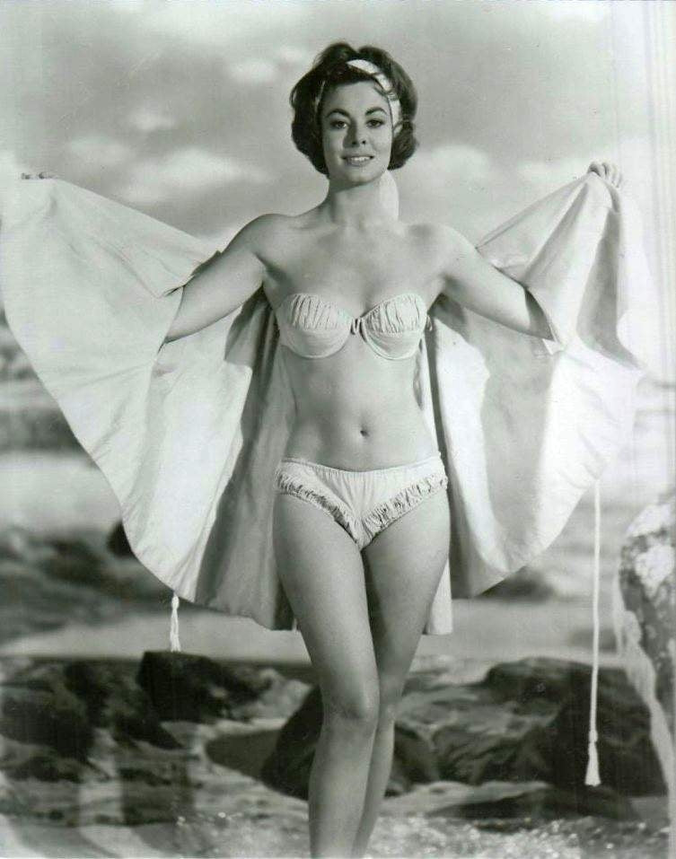 Anne Heywood Bikini Photo Print showcasing a vibrant beach scene.