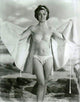 Anne Heywood Bikini Photo Print showcasing a vibrant beach scene.