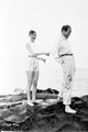 Audrey Hepburn Pointing Photo Print showcasing classic Hollywood elegance.