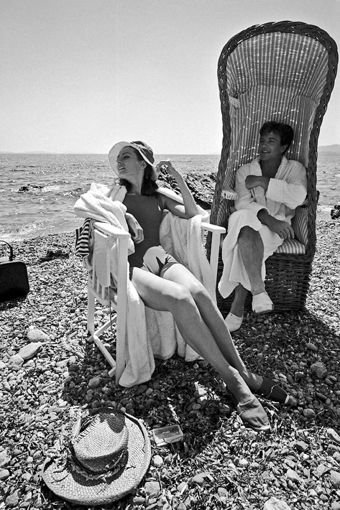 Audrey Hepburn beach chair photo print showcasing classic Hollywood elegance.