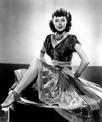 Ava Gardner On Table Photo Print showcasing the iconic actress in a timeless pose.