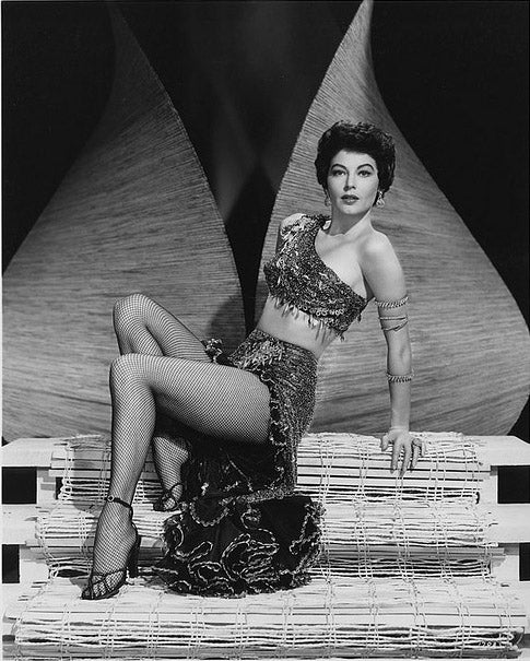 Ava Gardner Fishnets Pose Photo Print showcasing classic Hollywood glamour.