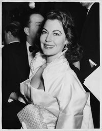 Ava Gardner Smile Photo Print showcasing the iconic actress in a classic pose.