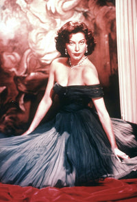 Ava Gardner Black Dress Sitting Photo Print showcasing timeless Hollywood elegance.