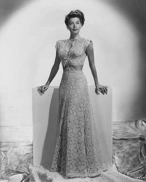 Ava Gardner photo print standing in dress, classic Hollywood style.