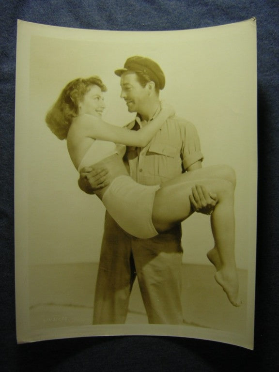 Ava Gardner In Arms Photo Print showcasing classic Hollywood glamour.