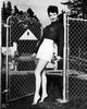 Ava Gardner Fence Gate Photo Print showcasing classic Hollywood elegance.