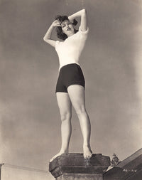 Ava Gardner standing photo print showcasing classic Hollywood elegance.