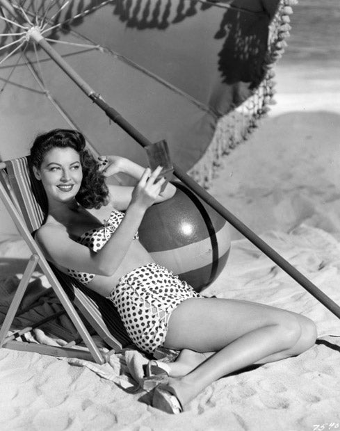 Ava Gardner Beach Mirror Photo Print showcasing classic Hollywood elegance.