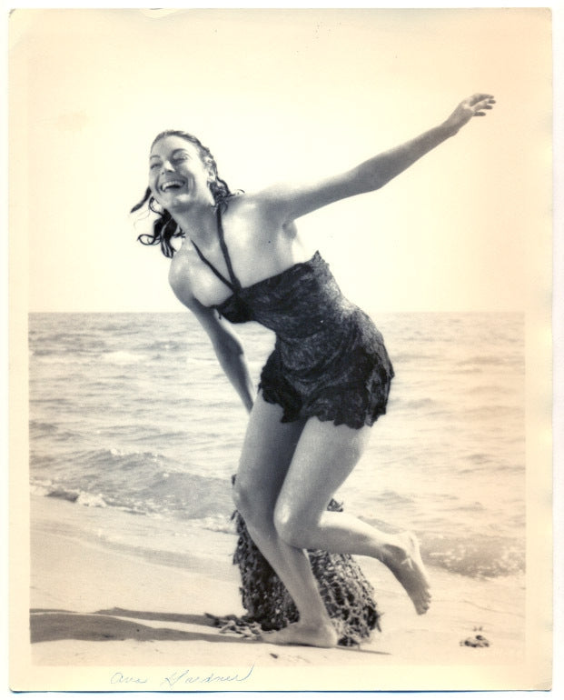 Ava Gardner running on the beach photo print