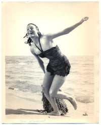Ava Gardner running on the beach photo print