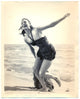 Ava Gardner running on the beach photo print