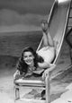 Ava Gardner Slide Stomach Photo Print showcasing classic Hollywood charm.
