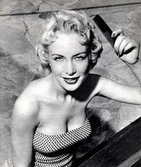 Barbara Eden Comb Photo Print showcasing the iconic actress.