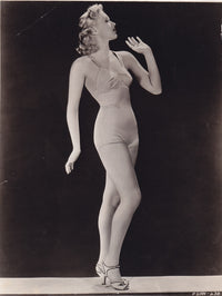 Betty Grable Hand Up Photo Print showcasing vintage Hollywood glamour.