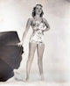 Betty Grable Umbrella Photo Print showcasing classic Hollywood style.