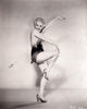 Betty Grable Leg Up Photo Print capturing the charm of classic Hollywood.