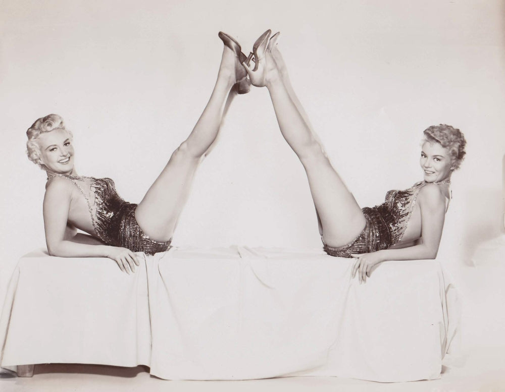 Betty Grable Legs Up Photo Print showcasing classic Hollywood glamour.
