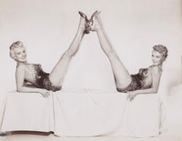 Betty Grable Legs Up Photo Print showcasing classic Hollywood glamour.