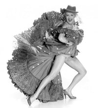 Betty Grable Action Shot Photo Print capturing classic Hollywood glamour.