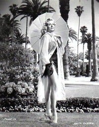 Anita Ekberg Parisol Photo Print showcasing classic Hollywood glamour.